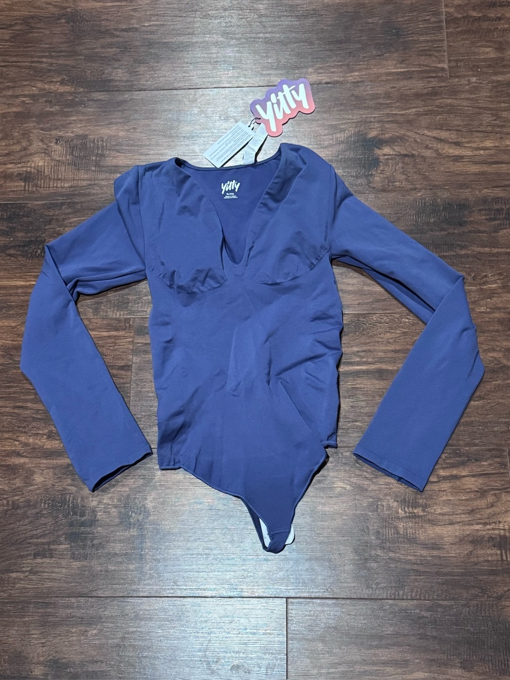 Yitty Nearly Naked Shapewear Plunge Long Sleeve Bodysuit in a blue/indigo shade